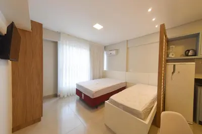 Uma cama ou camas num quarto em RESIDENCIAL MAR BLUE
