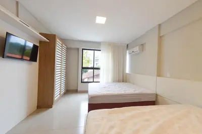 Uma cama ou camas num quarto em RESIDENCIAL MAR BLUE
