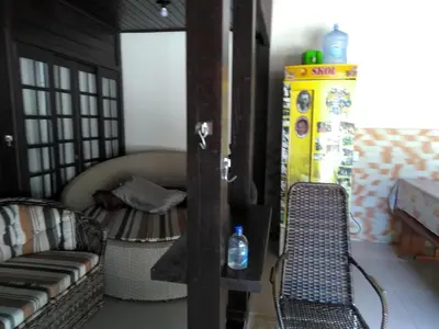 Uma área de estar em Casa familiar na Praia de Morrinhos