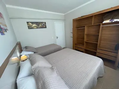 Uma cama ou camas num quarto em Praia De Palmas, apartamento 2 quartos, completo próximo a praia e todo comercio