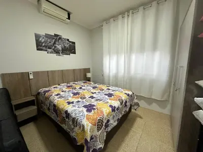 Uma cama ou camas num quarto em Praia De Palmas, apartamento 2 quartos, completo próximo a praia e todo comercio