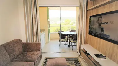 Uma televisão e/ou sistema de entretenimento em 1024 - Apartamento em Bombinhas para locação de temporada - Praia de Bombas