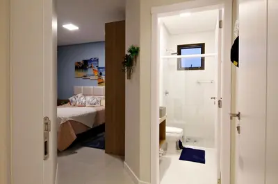 Uma cama ou camas num quarto em 1090 Finamente decorado 03 suítes na Praia de Bombinhas