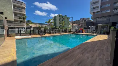 A piscina em ou perto de 006A - Apto novo 2 quartos em condomínio de luxo em Bombas