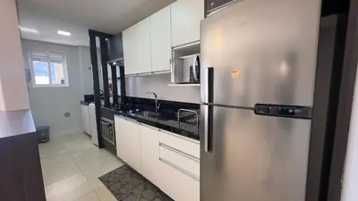 A cozinha ou kitchenette de 006B - Apto novo 2 quartos em condomínio de luxo em Bombas