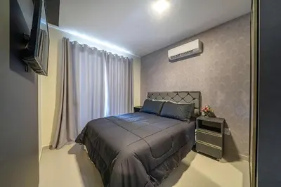 Uma cama ou camas num quarto em Apartamento 3 quartos