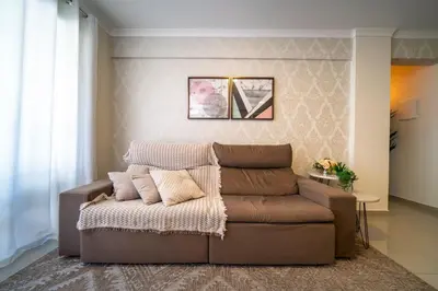 Uma área de estar em Apartamento 3 quartos