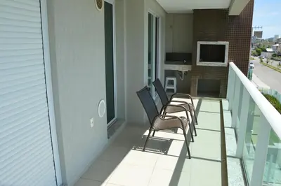 Uma varanda ou terraço em Belíssimo apto 2 suítes com vista para o mar