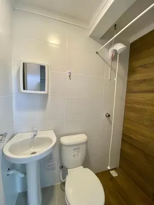 Uma casa de banho em Ondas do Mar Residencial