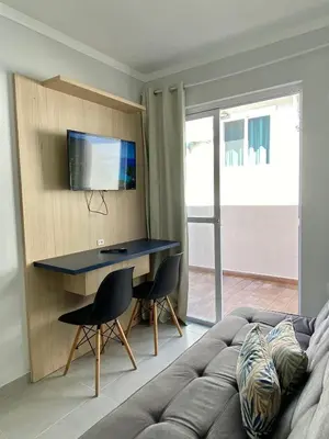 Uma televisão e/ou sistema de entretenimento em Ondas do Mar Residencial