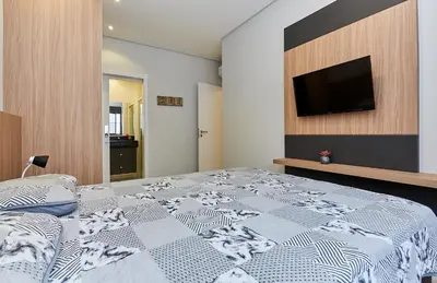 A planta de 1086 Apartamento novo com 02 vagas de garagem À 100 metros da praia do centro de Bombinhas