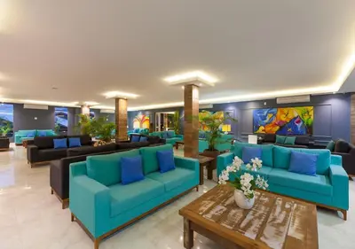 Uma área de estar em Castellammare Bombinhas Flat Residence