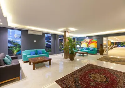 Uma área de estar em Castellammare Bombinhas Flat Residence