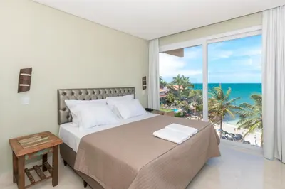 Uma cama ou camas num quarto em Castellammare Bombinhas Flat Residence