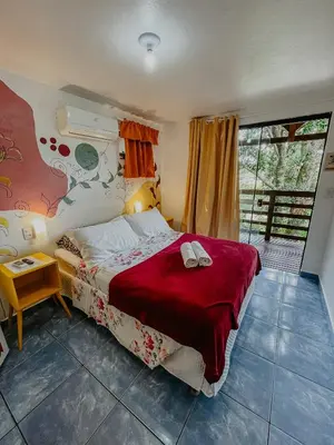 Uma cama ou camas num quarto em Pousada Praia de Bombinhas