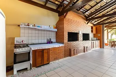 A cozinha ou kitchenette de Flamboyant Apartamentos Bombinhas