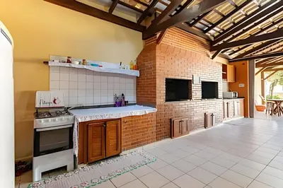 A cozinha ou kitchenette de Flamboyant Apartamentos Bombinhas