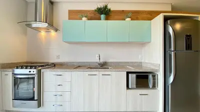 A cozinha ou kitchenette de PM 205 · Apartamento de Alto Padrão com Rooftop, 3 quartos na Praia Bombinhas com excelente localização.