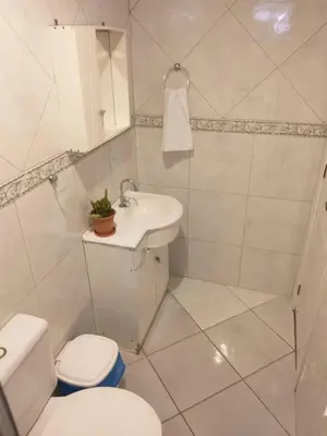 Uma casa de banho em Solar das Flores apto 03