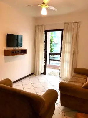 Uma televisão e/ou sistema de entretenimento em Solar das Flores apto 06