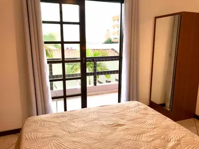 Uma cama ou camas num quarto em Solar das Flores apto 06