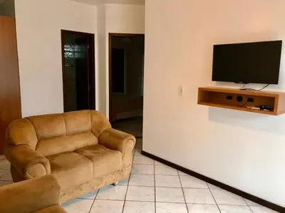 Uma televisão e/ou sistema de entretenimento em Solar das Flores apto 06