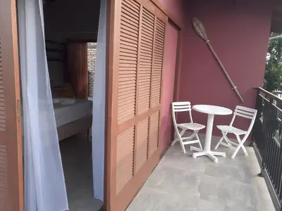 Uma varanda ou terraço em Vila Figueiredo das Donas - Suíte Espaço Gourmet