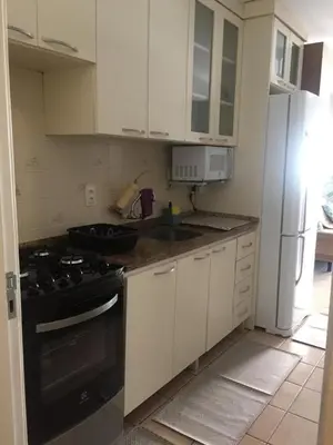 A cozinha ou kitchenette de Apartamento Duplex em Itapema a 250 metros do mar