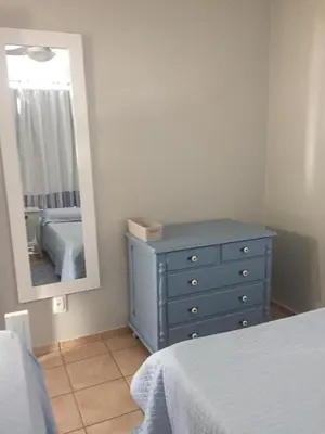 Uma cama ou camas num quarto em Apartamento Duplex em Itapema a 250 metros do mar