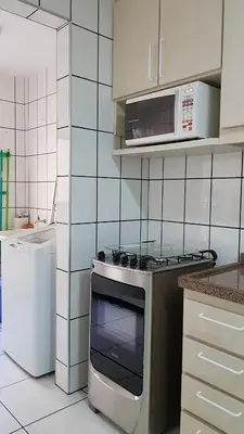 A cozinha ou kitchenette de Apto em prédio frente ao mar, Meia Praia Itapema, linda vista, 3 dormitórios