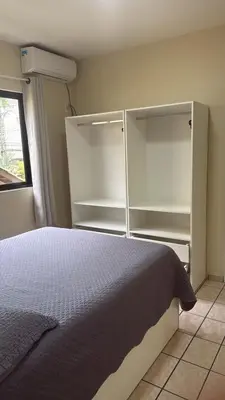 Uma cama ou camas num quarto em Apto Frente Mar