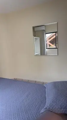 Uma cama ou camas num quarto em Apto Frente Mar