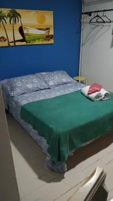 Uma cama ou camas num quarto em Pousada das Gaivotas