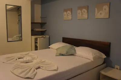 Uma cama ou camas num quarto em Pousada das Gaivotas