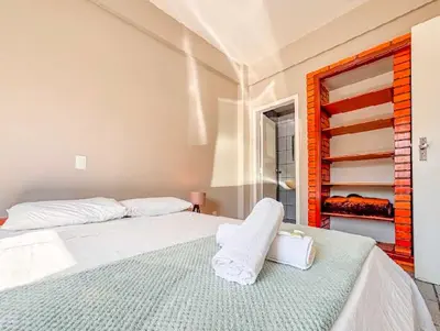 Uma cama ou camas num quarto em Pousada Vila Del Mare - Frente Praia
