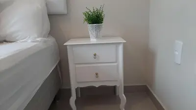 Uma cama ou camas num quarto em Pousada Tijucas