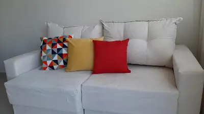 Uma cama ou camas num quarto em Pousada Tijucas