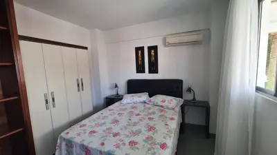 Uma cama ou camas num quarto em PRAIA DE 4 ILHAS Apartamento De 1 Quarto a 50M Praia Com Vista