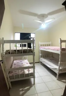 Uma cama ou camas num quarto em Residencial Beija Flor, 3 quartos - Mariscal