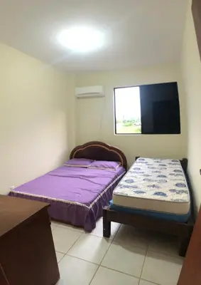 Uma cama ou camas num quarto em Residencial Beija Flor, 3 quartos - Mariscal