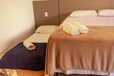 Uma cama ou camas num quarto em Morada do Estaleiro