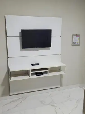Uma televisão e/ou sistema de entretenimento em Novo Lar Itapema-2