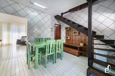 Uma área de estar em Casa com 03 dormitórios de casal