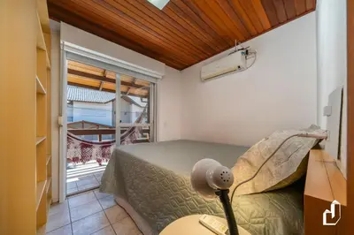 Uma área de estar em Casa com 03 dormitórios de casal