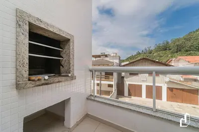 Uma varanda ou terraço em Apartamento com 03 dormitórios