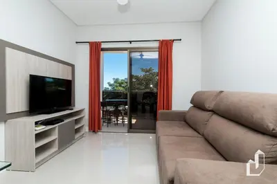 Uma televisão e/ou sistema de entretenimento em Cobertura Duplex com jacuzzi aquecida