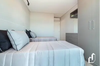 Uma cama ou camas num quarto em Lindo apartamento vista mar com 02 suítes