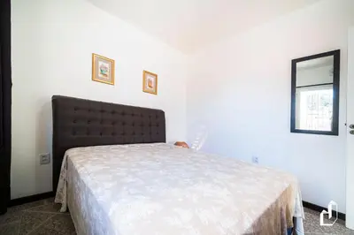Uma cama ou camas num quarto em Casa com 03 dormitórios climatizados com berço