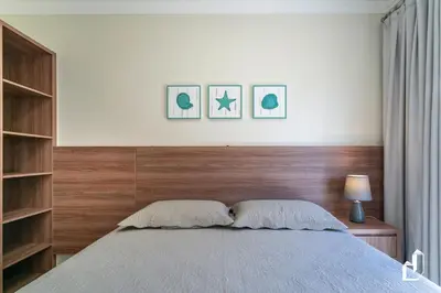 Uma cama ou camas num quarto em Apartamento térreo com 02 dormitórios