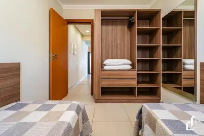 Uma cama ou camas num quarto em Apartamento térreo com 02 dormitórios